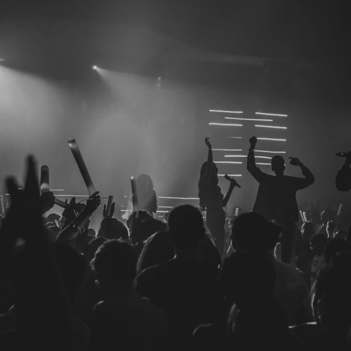 people doing a party in a room grey-scale photography